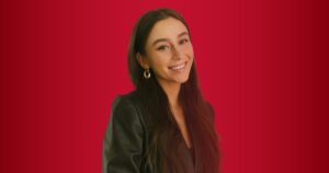 Social Assurance intern Maggie Mantini with a red background
