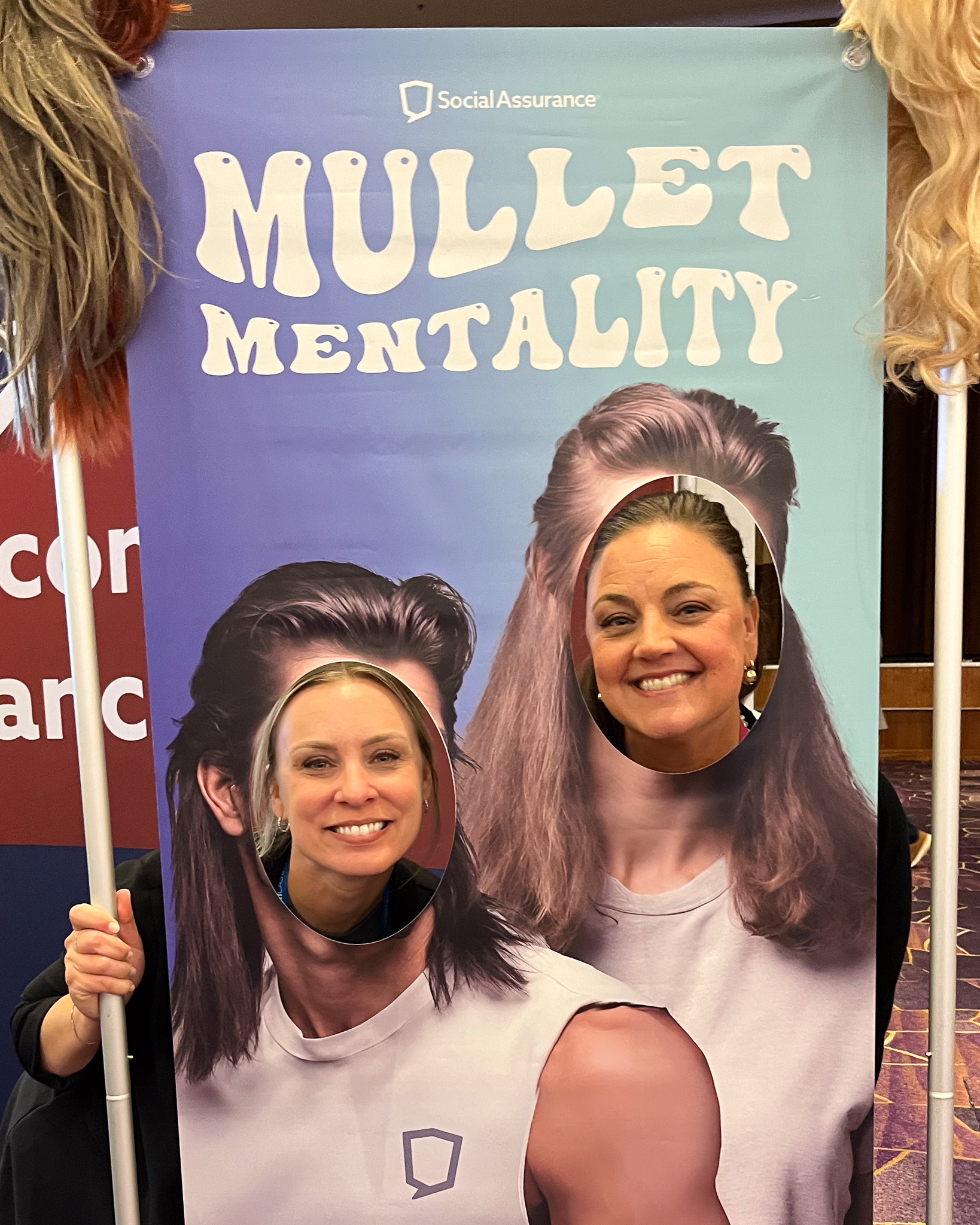 Jess posing with a Financial Brand attendee.